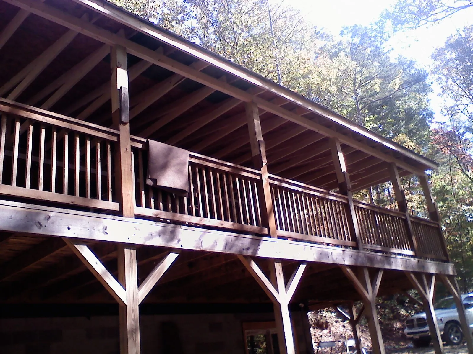 Timber framing under a new elevated porch and deck — Roof Leak Repair in Pharr by Roofing Brothers